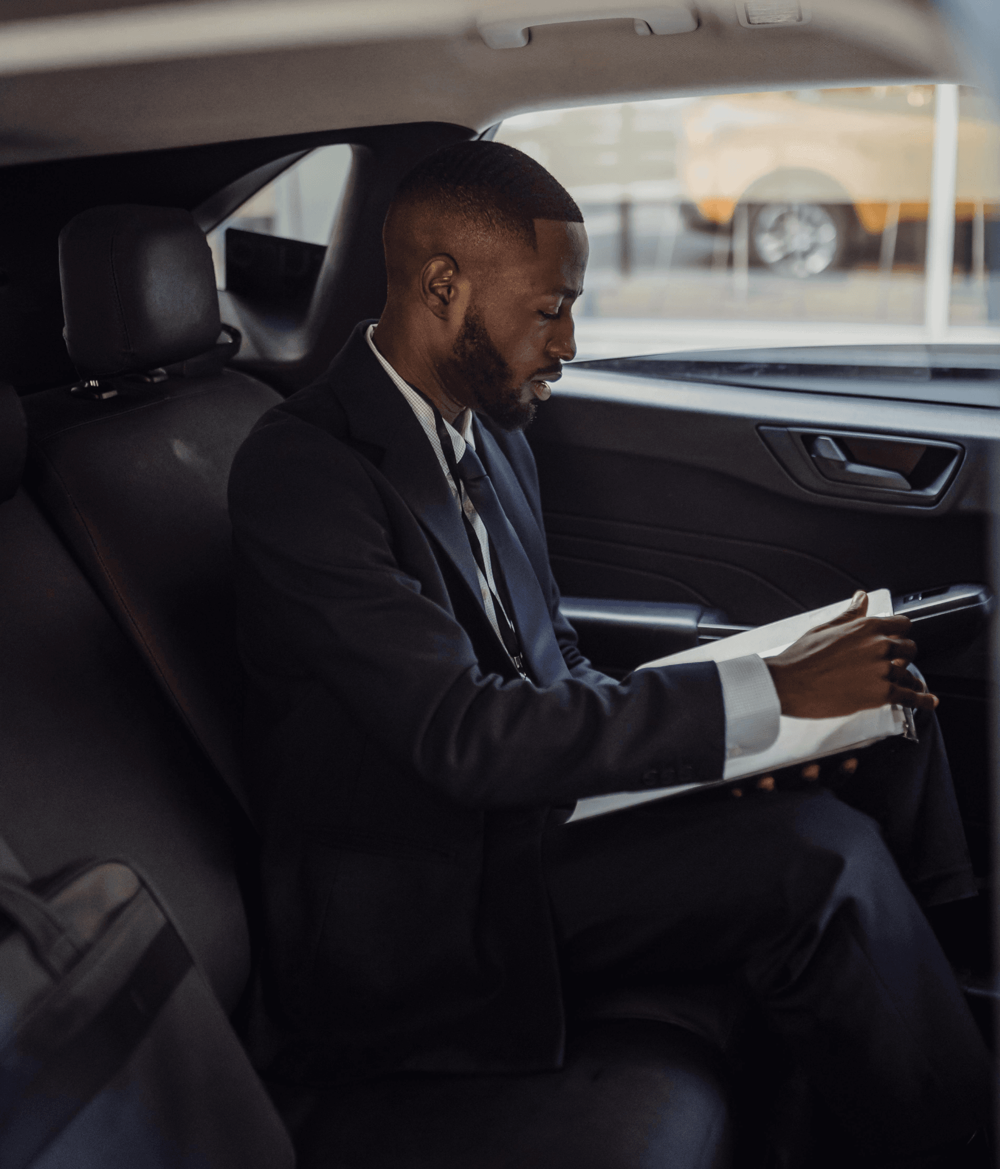Professional rider seated comfortably in a car